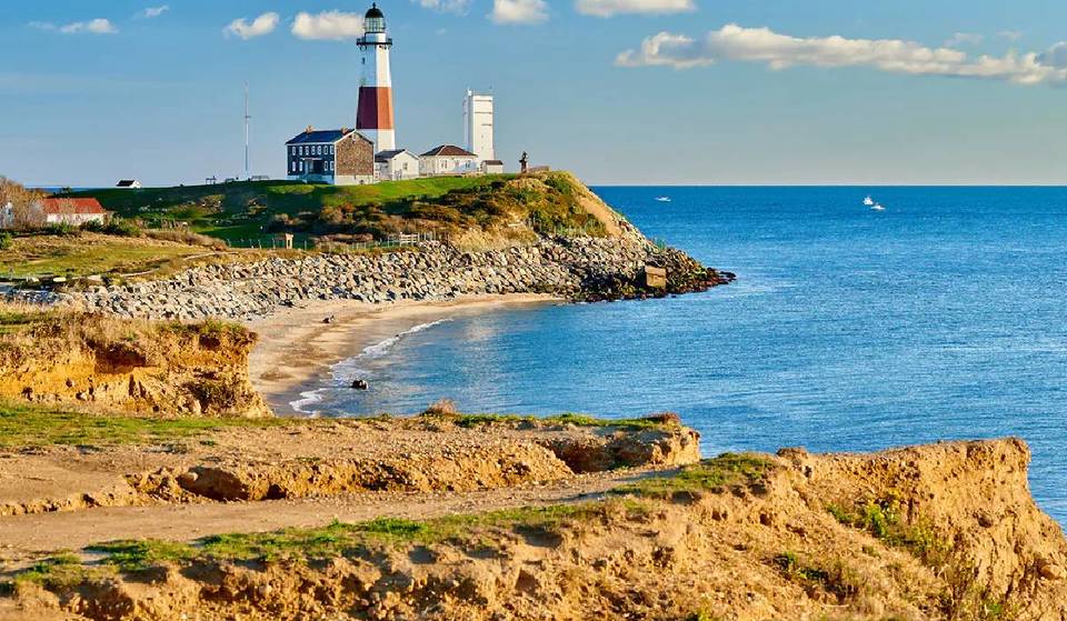 Forget the Hamptons: this scenic route on Long Island is one of the best for a summer escape — with dramatic cliffs, hidden castles, &amp; seaside sunset views