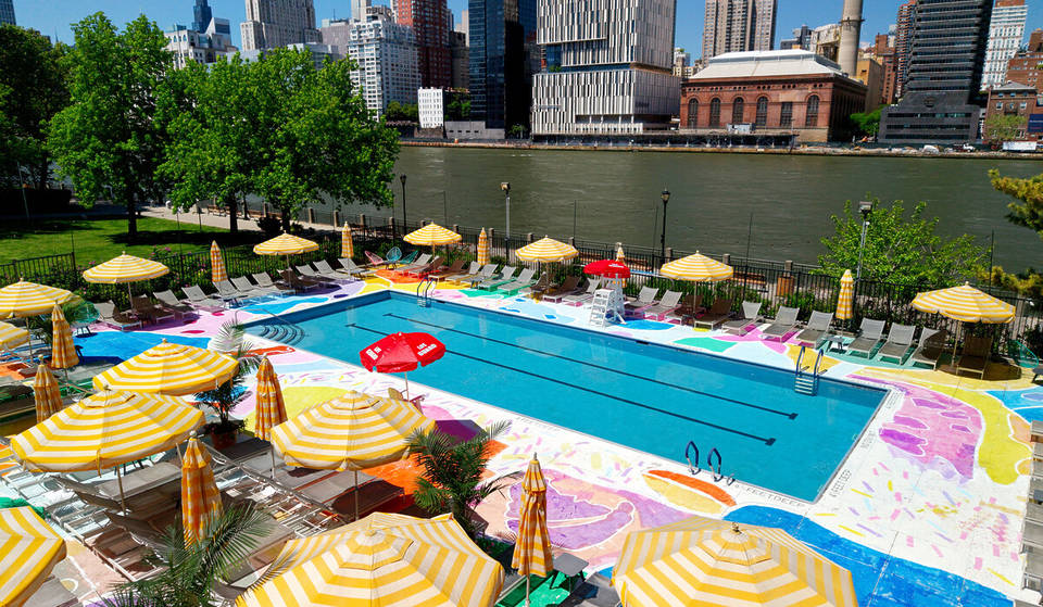 This 8.5-acre waterfront escape in Manhattan is officially open for the summer — featuring a taffy-inspired pool deck and panoramic river views.