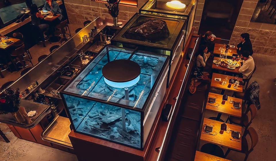 One of Williamsburg’s newest openings features a giant living aquarium behind the bar—and it secretly connects to a modern art gallery