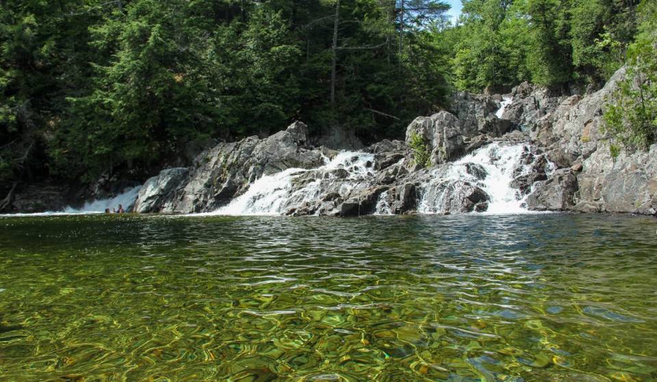 Just 90 minutes from Manhattan sits a natural mountain oasis carved into rugged granite cliffs—offering crystal-clear glacial waters, a 12-foot hidden waterfall, and an escape from the city’s crowded public pools