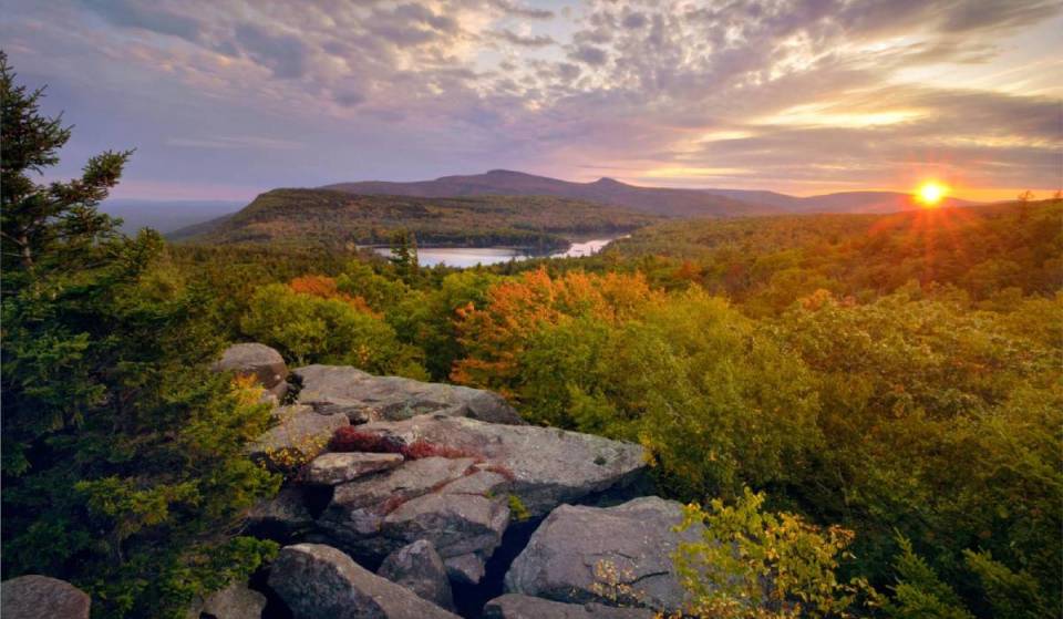 This hidden 2-lake alpine sanctuary in the Catskills sits on a historic 19th-century mountain cliff edge—offering crystal-clear glacial waters, towering pine backdrops &amp; way fewer crowds than the Jersey Shore