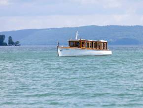 Spar dir den Flug nach Italien: New Yorks „Little Lake Como“ ist nur 3 Stunden von NYC entfernt – mit terrassierten Weinbergen, Sonnenuntergangsfahrten und „La dolce vita“-Flair