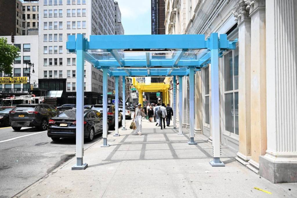 After decades, NYC is finally replacing its infamous ‘eyesore’ scaffolding — and the new sidewalk sheds are brighter, wider &amp; more convenient