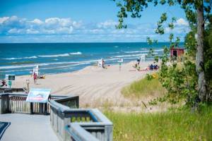 This New York beach is home to the tallest freshwater sand dunes in the Northeast—with scenic boardwalks winding through a rare protected landscape