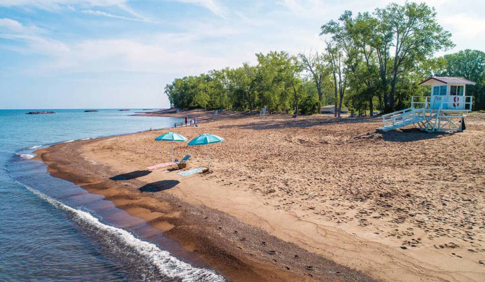 The best swimming lake in the U.S. is a 6-hour drive from NYC. A massive freshwater getaway boasts hidden sandy beaches and warm crystal waters