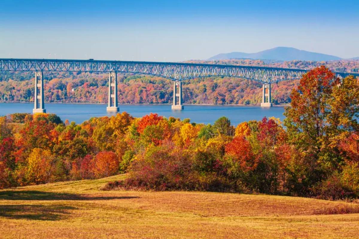 This charming riverside town just 2 hours from NYC was named the best getaway by travel experts — and it's perfect for autumn, with fall foliage, waterfalls, river views & cozy cafés