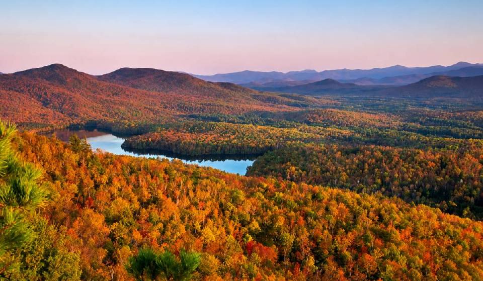 This enormous 6 million-acre New York park is bigger than Yellowstone, Yosemite, Grand Canyon, Glacier and Zion combined—and you can see its fall color by gondola, plane or hot air balloon