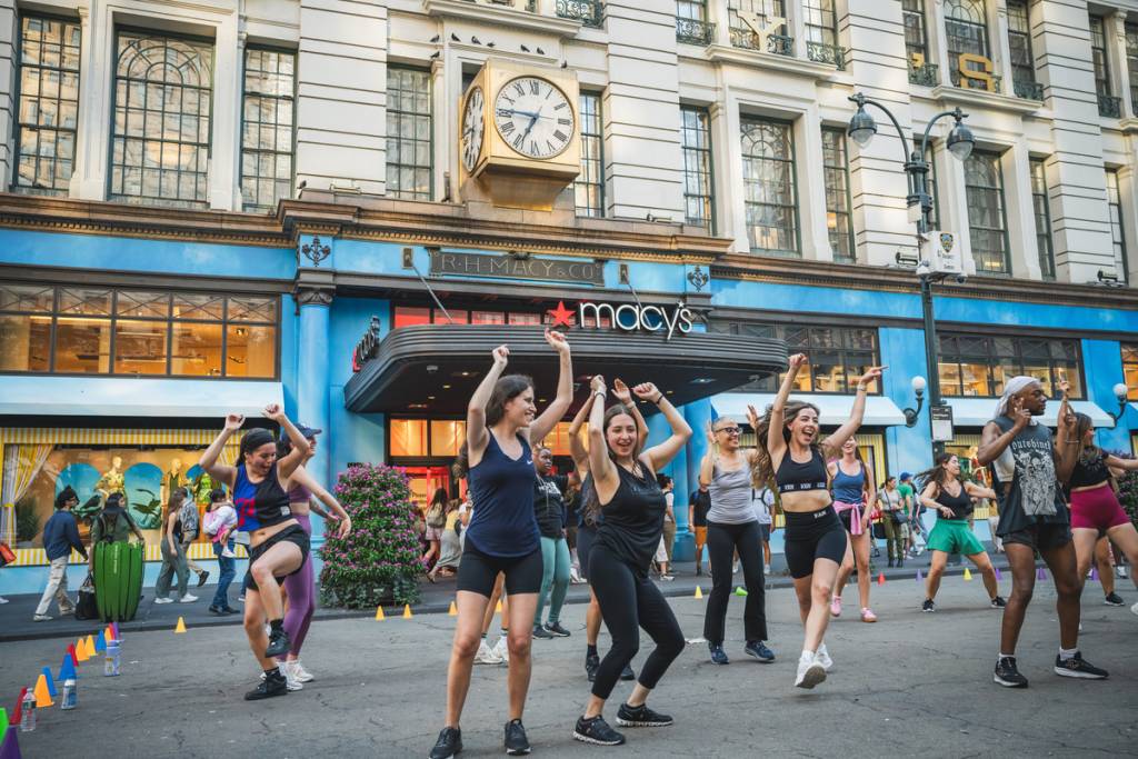 Right in the center of Midtown: NYC is extending its massive free outdoor fitness classes in Herald and Greeley Square through autumn