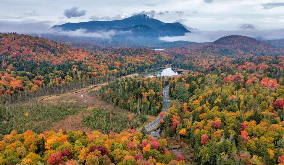 The Adirondacks was just named one of the best U.S. fall foliage destinations — with 2-hour rail bikes, local hard cider tastings, and an 8-acre corn maze