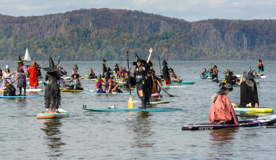 This one-day-only Halloween festival 1 hour from NYC features hundreds of witches paddleboarding in NY’s real-life spooky town