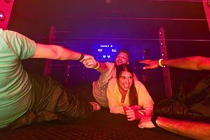 Guests make their way through challenge rooms