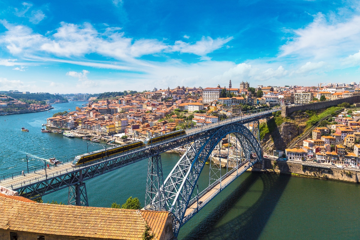 an aerial photo of a train line in portugal