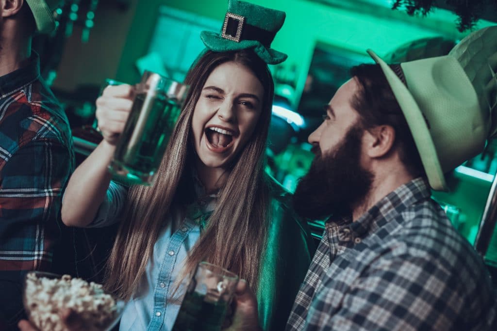 a photo of a man and woman celebrating st patrick's day