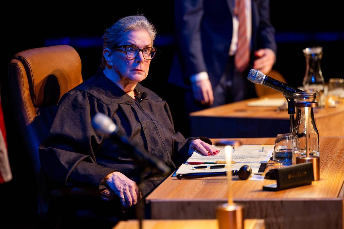 The judge sat at her desk at The Jury Experience