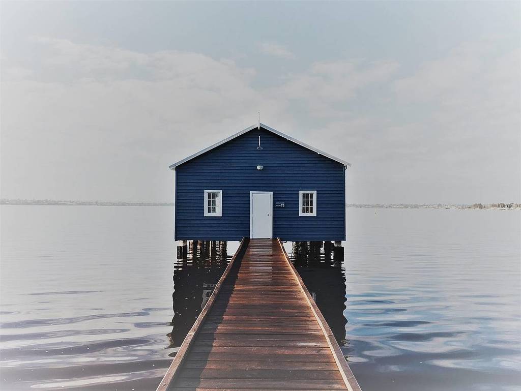 Blue house on the Swan river in Perth