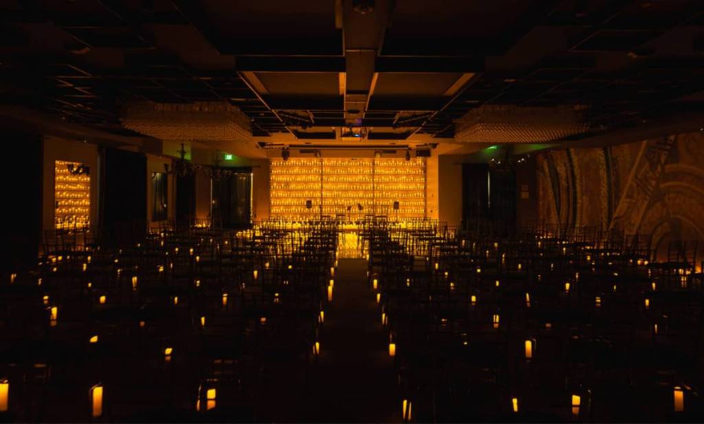 venue filled with candles as part of candlelight concert
