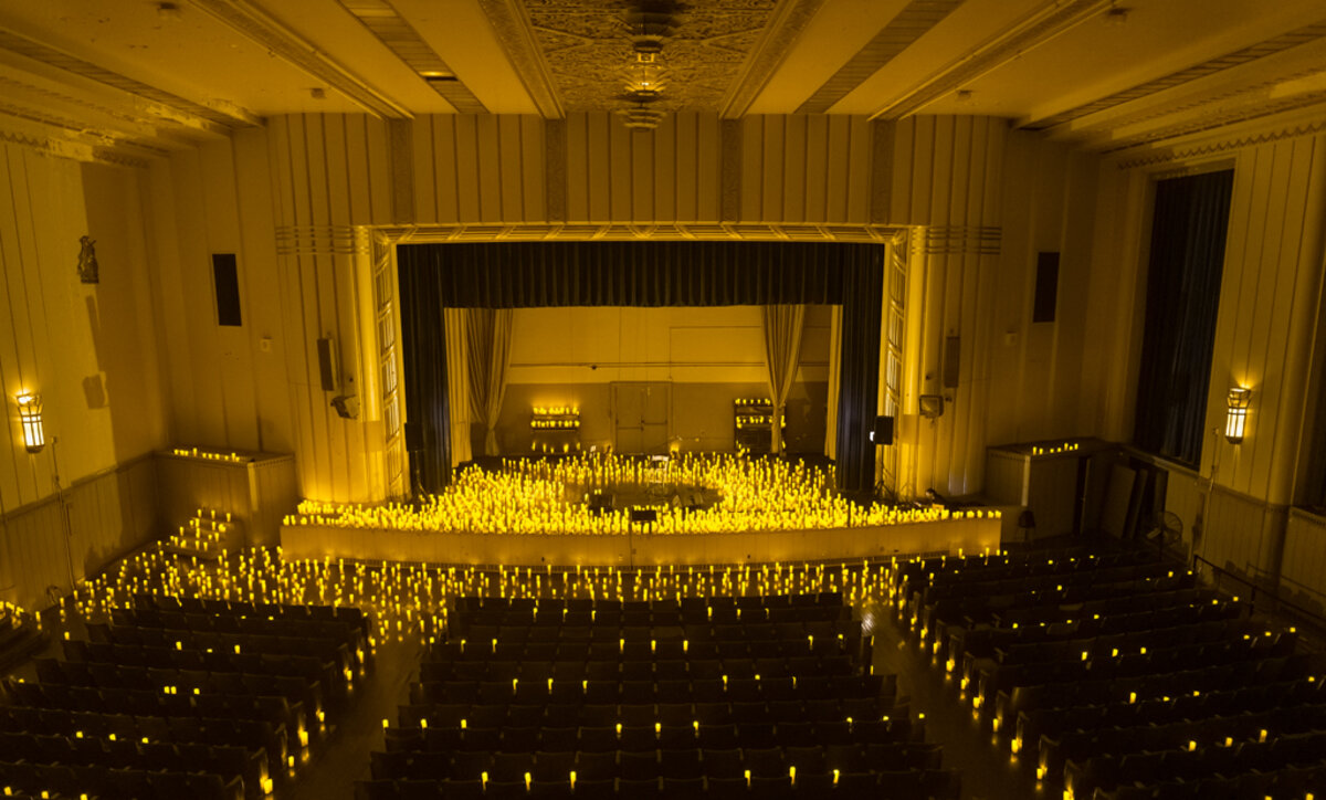 Bok auditorium filled with candles at a Candlelight concert.