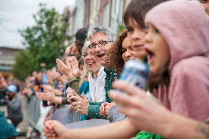 spectators cheering at local match