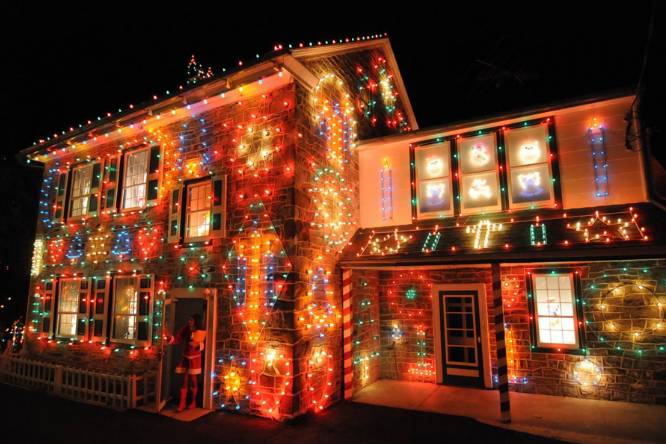 a decorated house in a Christmas village