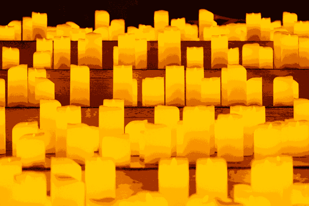 Thousands of candles scattered around a stage at a Candlelight concert