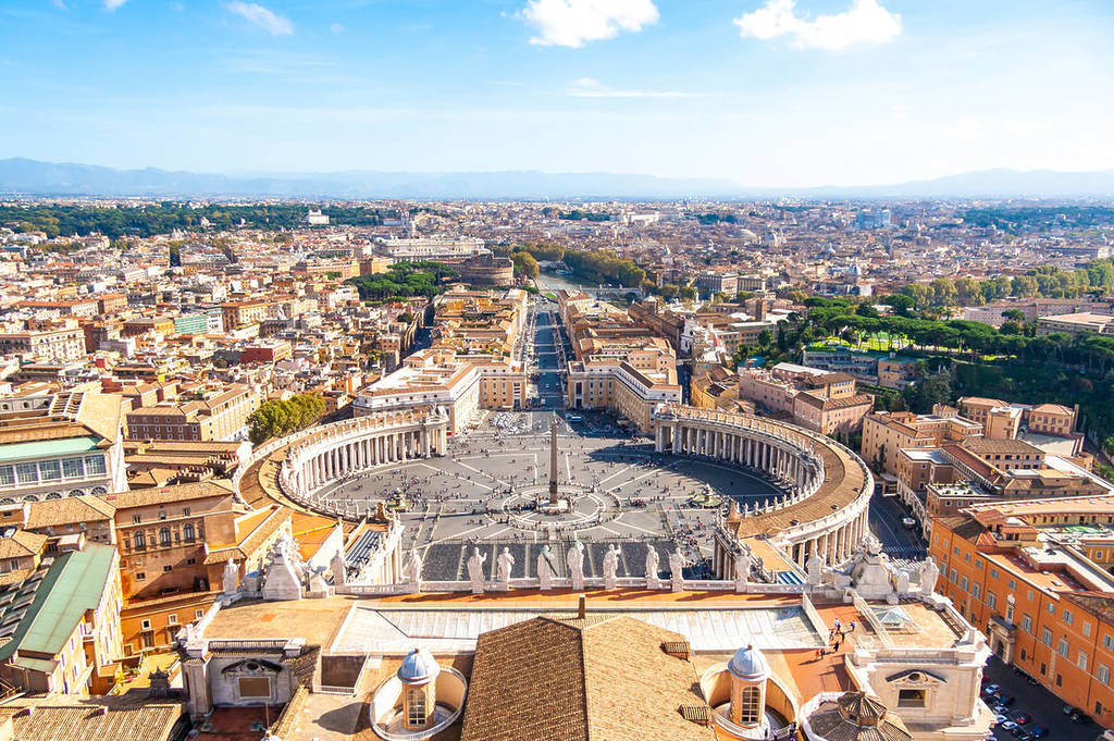 Panoramic view of St. Peter's Square and Rome from the top of the basilica's dome.