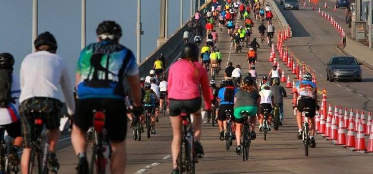 bikers over the Coronado Bay Bridge