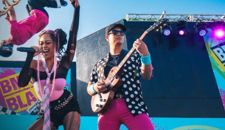 artists on stage at a concert