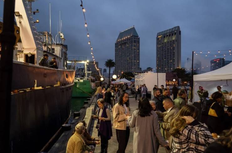 people at a night market in August in San Diego