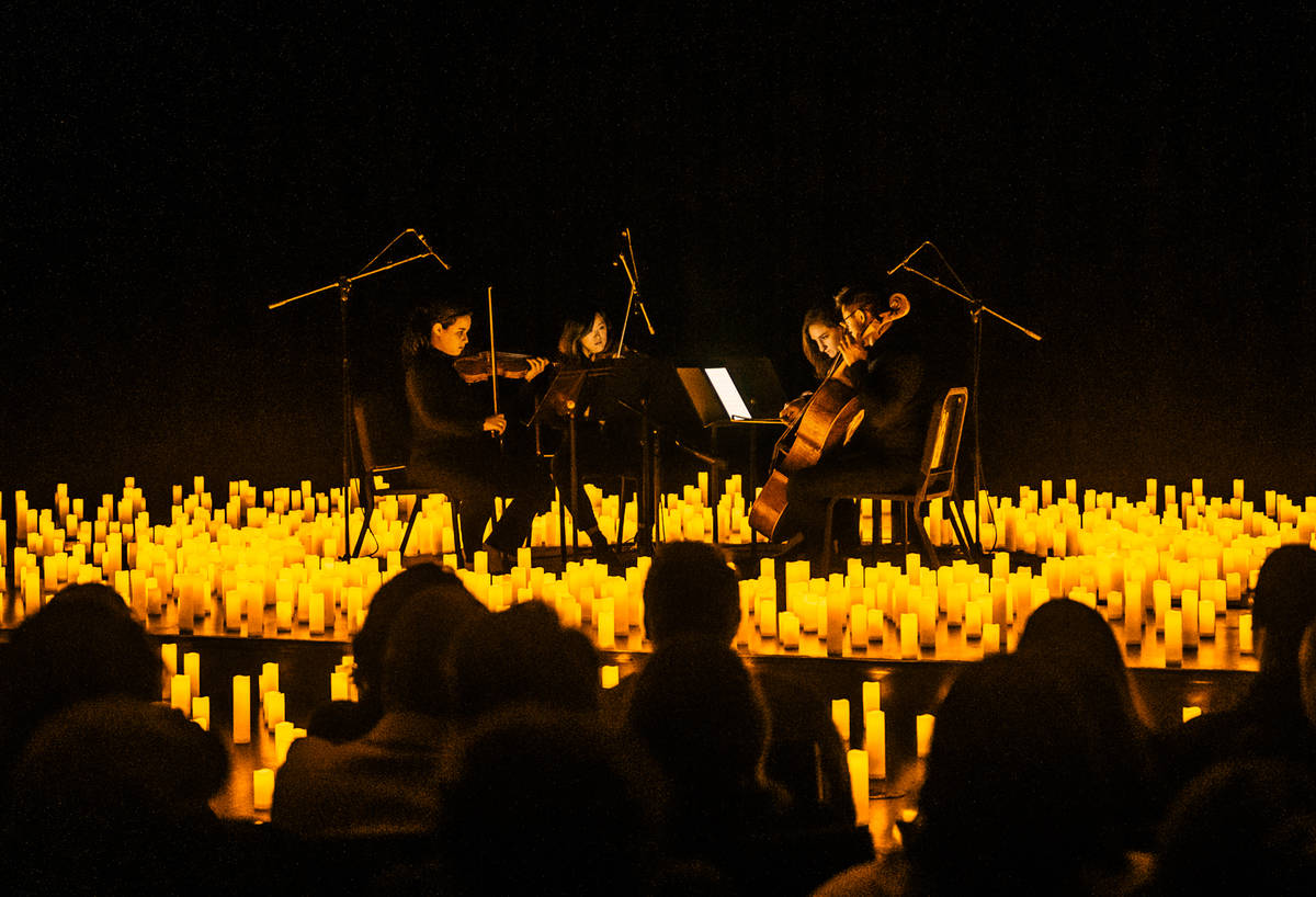 An audience watches a Candlelight concert in San Diego.