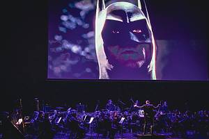 A live orchestra plays alongside Batman (1989)