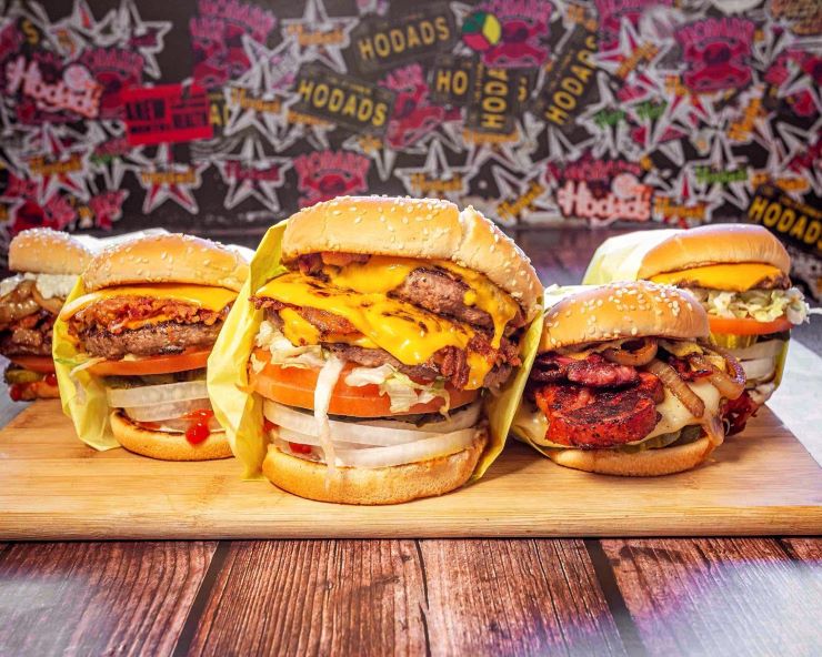 close-up of 3 burgers