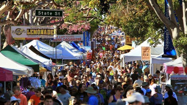 crowd at village faire taking place this November in Carlsbad San Diego
