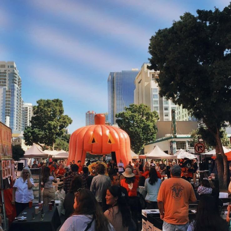 people at a Fall festival in San Diego