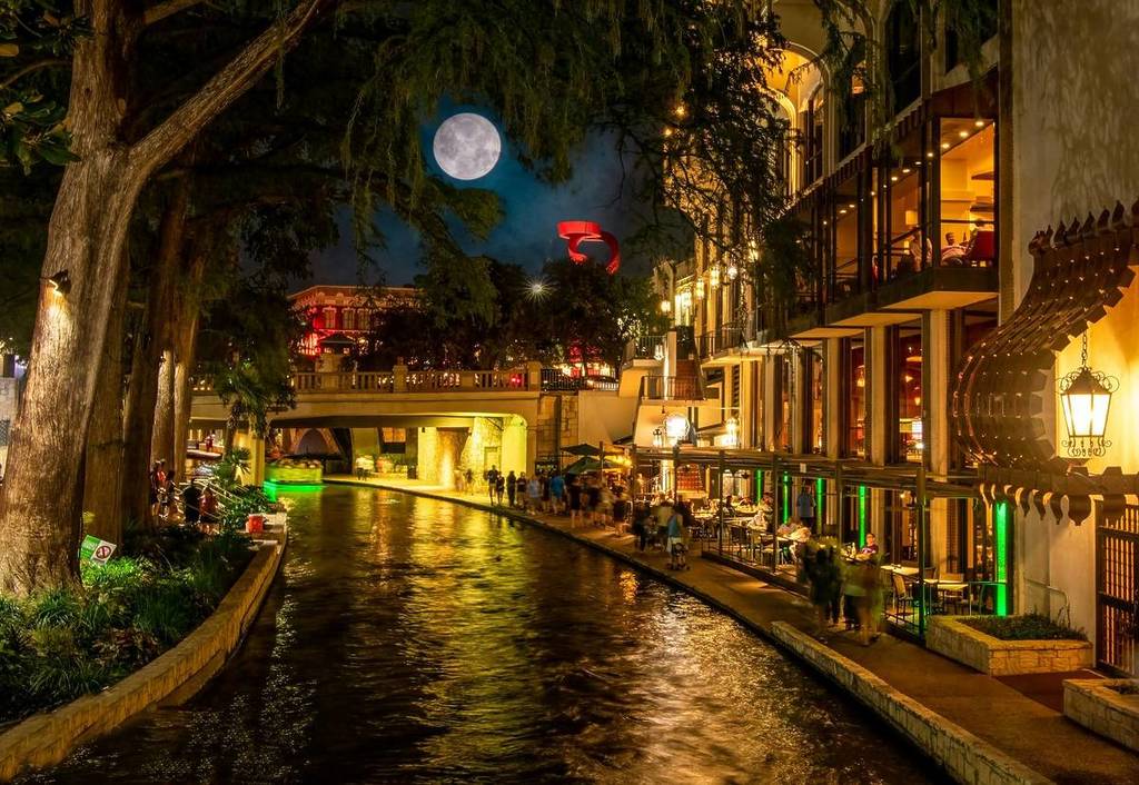 San Antonio at night with full moon