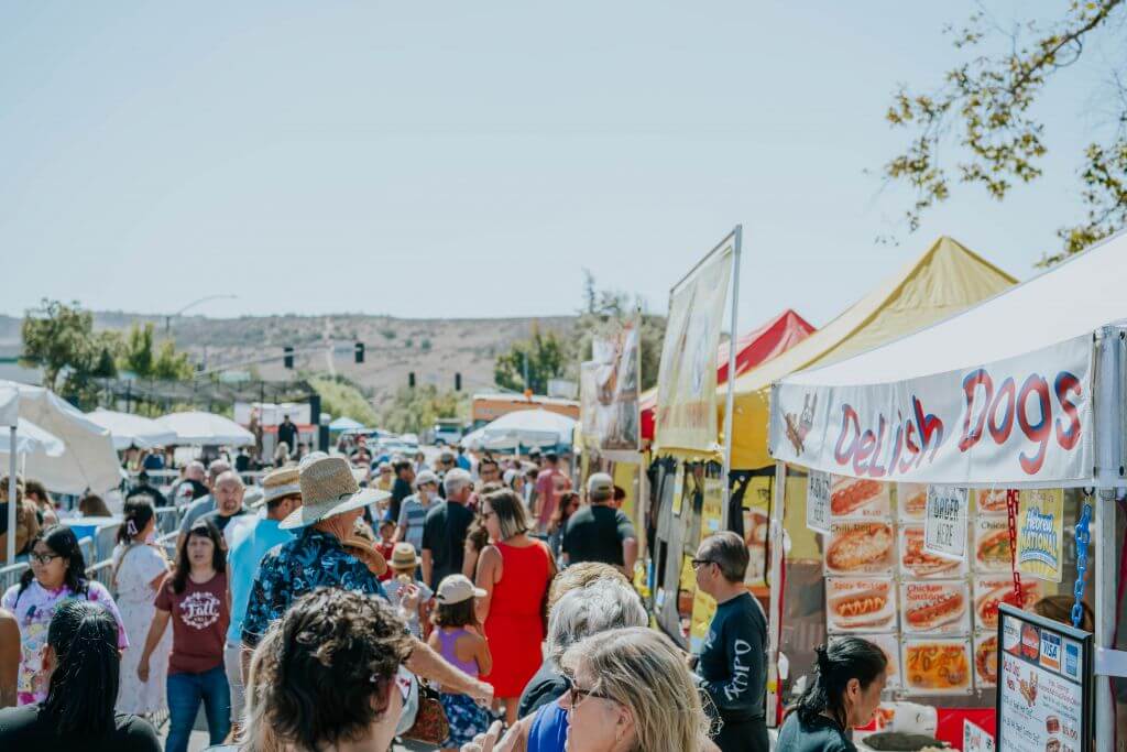 people at a festival in Poway