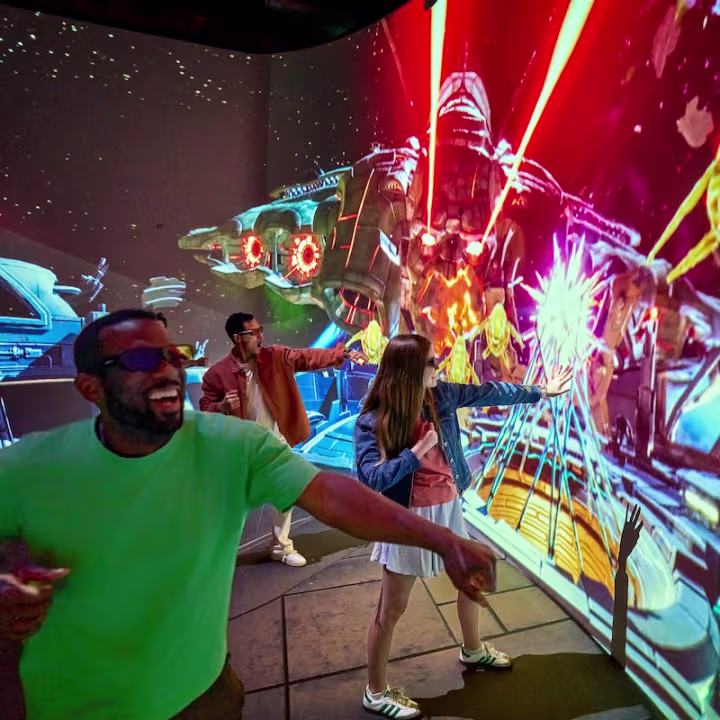 people playing in a Superman Experience