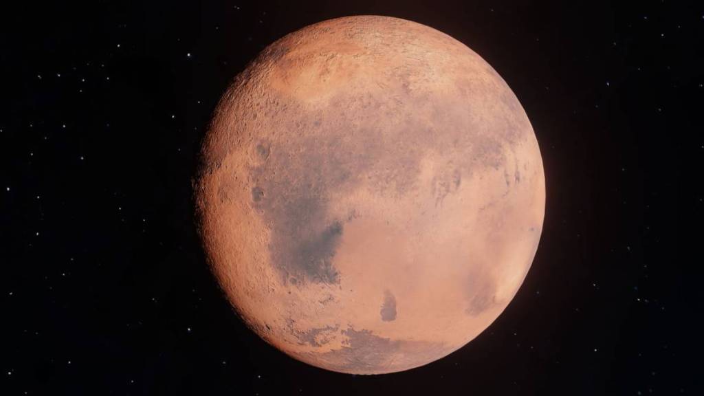 close up photo of Mars with red hue