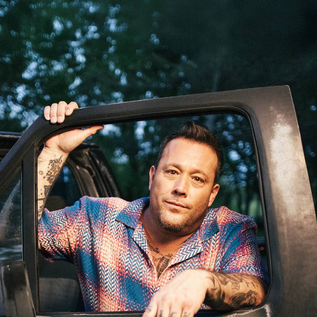 Uncle Kracker in a truck