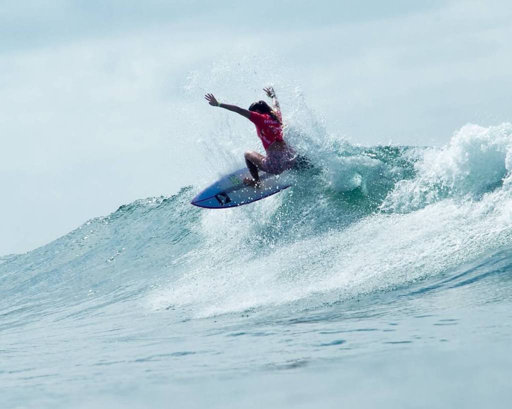 woman surfing