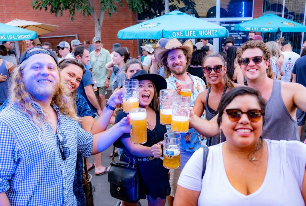 people drinking Oktoberfest beers