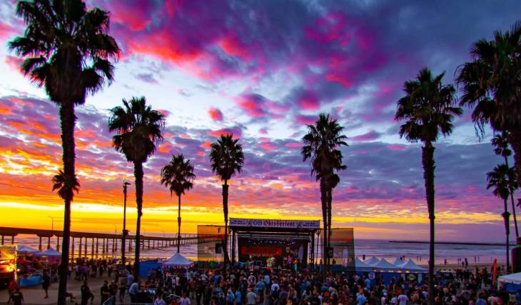 Drawing 10,000 locals, San Diego’s biggest beachside Oktoberfest returns with a nostalgic Y2K neon takeover and brat-eating contests
