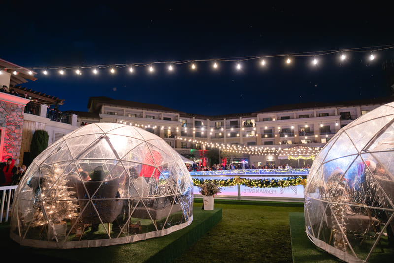 Merry Meritage private igloos and ice rink.