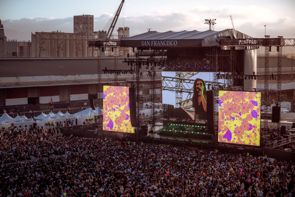 A stage with a huge crowd at Portola