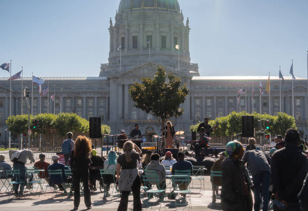 civic center free concert with people dancing