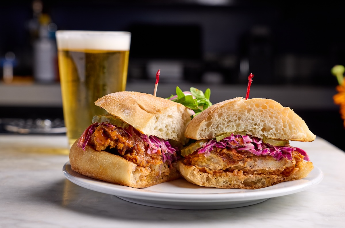 a chicken sandwich and beer at Rikki's bar in sF