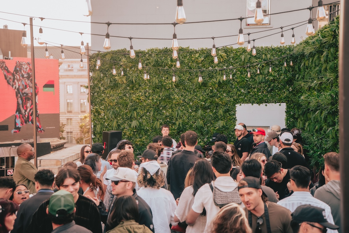a crowd dancing on a rooftop