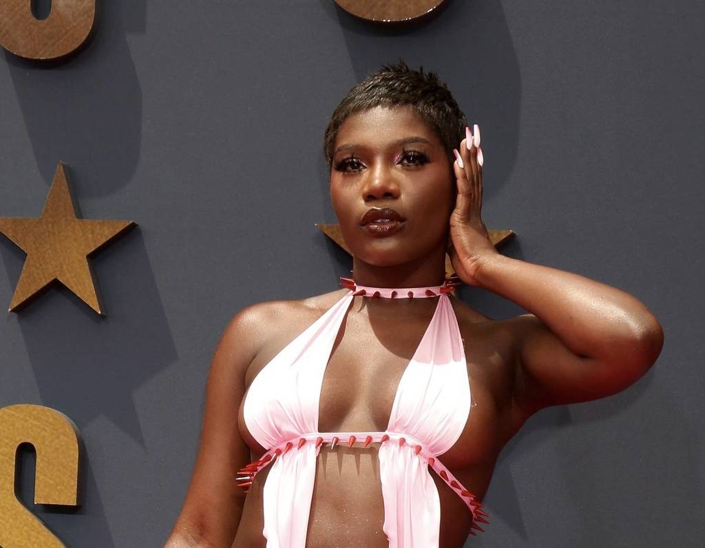 Doechii posing for a photo