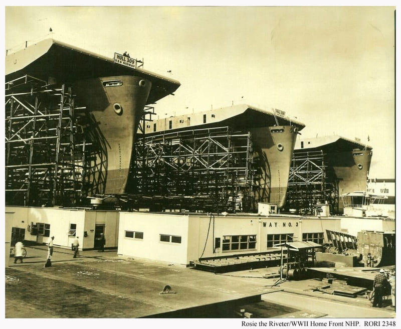 Historic photograph of WWII ships being built.