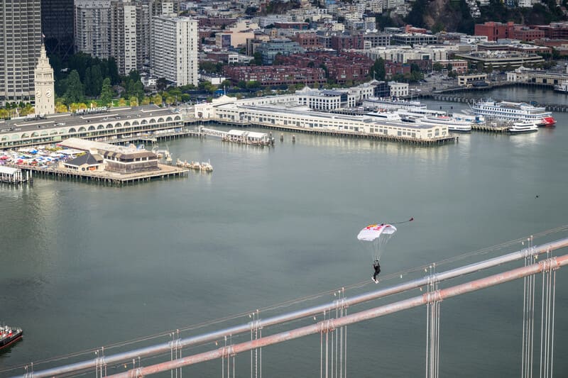Sean McCormac lands on the Bay Bridge suspension cables.