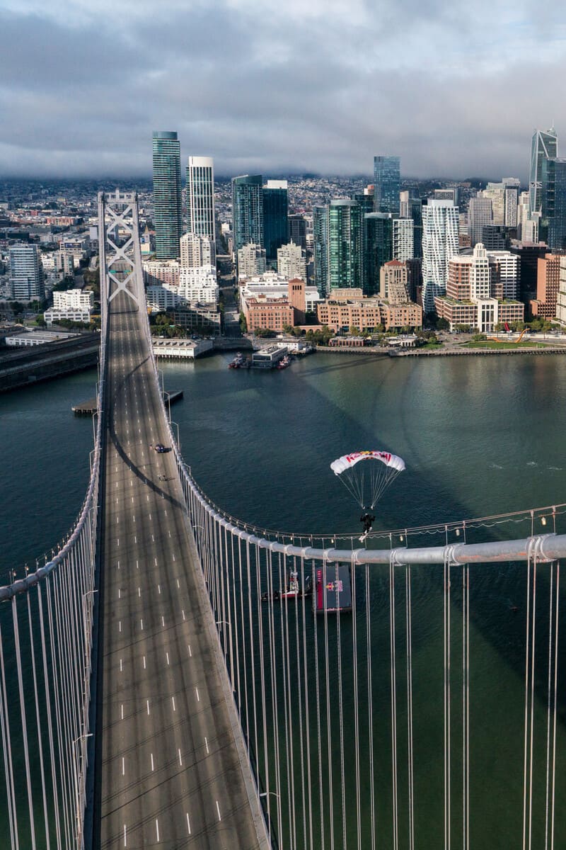 Sean McCormac lands on the Bay Bridge suspension cables.